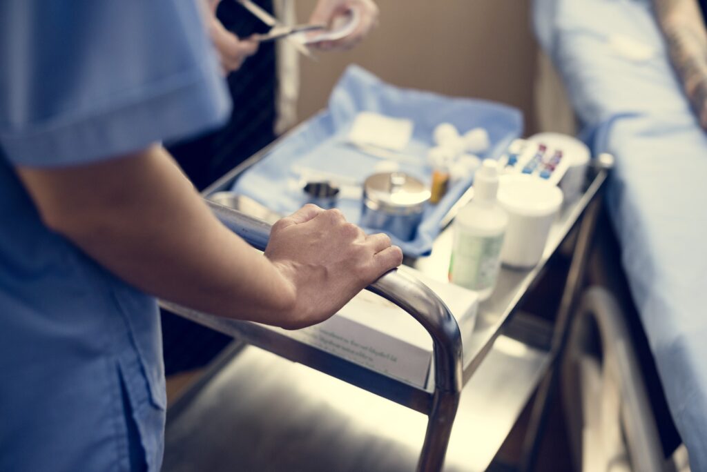 Nurse preparing medical equipments